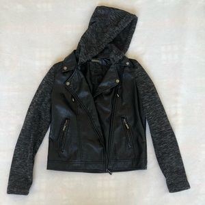 Leather vest with soft materials sleeves